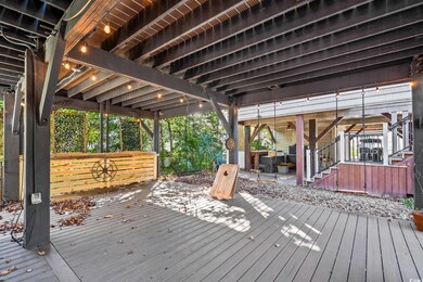 Wooden terrace with a patio area