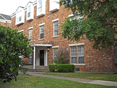 View of property with a front lawn