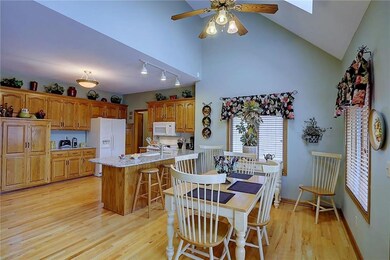 BEAUTIFUL HARDWOODS IN HUGE EAT - IN KITCHEN, SKY LIGHTS, VERY LIGHT & BRIGHT