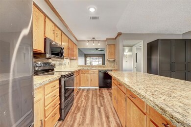 1283 S Crystal Way, Aurora, CO 80012 - photo 4