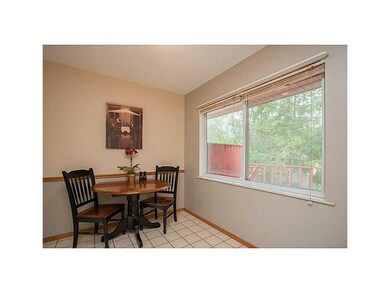 Eat-in Kitchen. Kitchen is currently staged with a