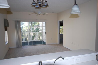 Interior space with ceiling fan with notable chand