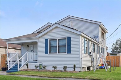 Corner lot with rear yard vehicle access.