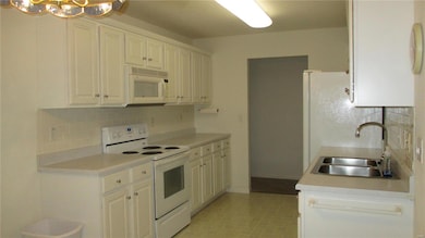 Appliances stay, including new refrigerator.