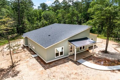 Aerial View: Metal and Architectural Shingle Roof