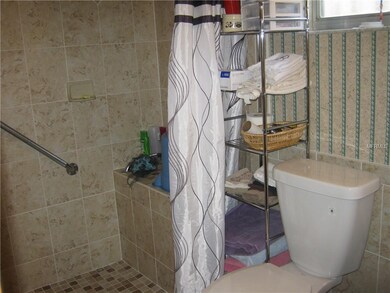 UPGRADED CERAMIC TILED MASTER BATH WITH LARGE WALK