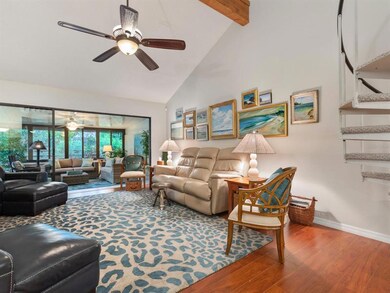 Spacious Great Room Design With Wonderful Soaring Ceiling & Same Beautiful Floors.  Spiral Stairs to the Right Of Photo Lead to the Neat Loft.