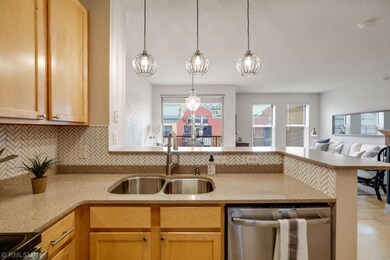 Bar lighting to accompany eat-in kitchen counter.