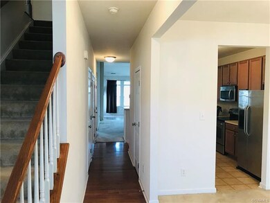Open first floor layout offers engineered hardwood