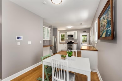 The kitchen is inviting with coffee station and pl