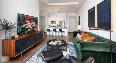 Living room featuring dark hardwood / wood-style f