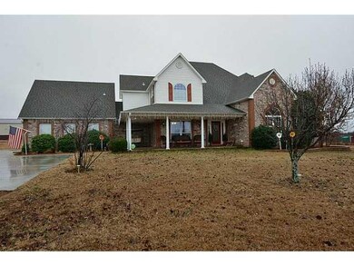 Exterior Front. Large covered front porch.