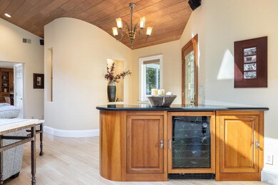 A built in wine refrigerator in the peninsula in g