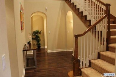 ENTRYWAY TO CATHEDRAL CEILINGS AND MAIN FLOOR BEDR