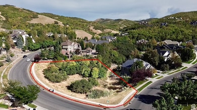 Aerial overview of property's location with property parcel outlined close up