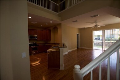 WOOD LAMINATE & PORCELAIN TILE THROUGHOUT DOWNSTAI