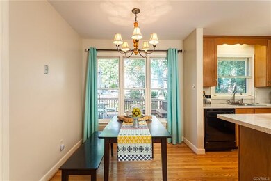 Breakfast nook overlooks the backyard. Plenty of natural light streams in.