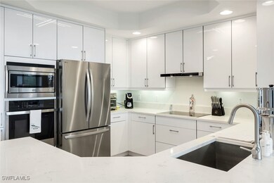 Caribe at Cove Tower unit 403, Naples, FL 34110 - photo 4