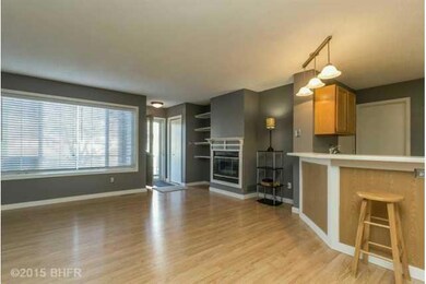 Living Room. Laminate wood flooring on the main le