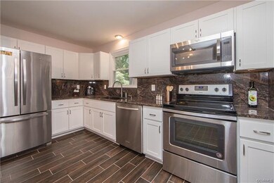 New cabinets and stainless steel appliances
