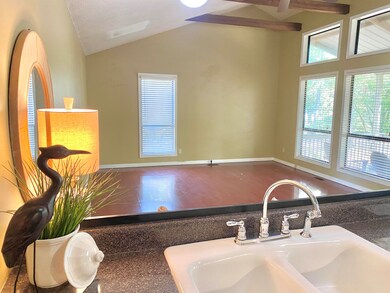 Interior space featuring a textured ceiling, sink,