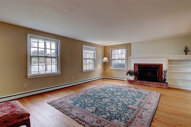 Oversized living room with hardwood floors