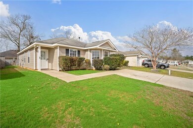 View of front of house featuring a garage and a fr