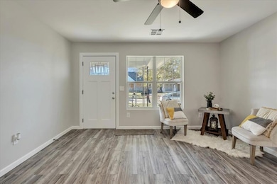 Entryway featuring light wood-style flooring and baseboards