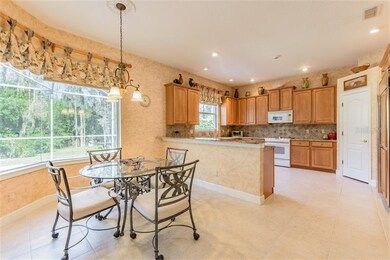 Bright and sunny kitchen with eat in area that vie