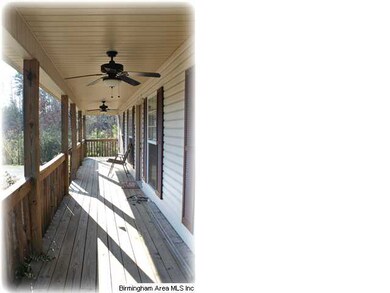 This porch begs for sweet tea and rocking chairs