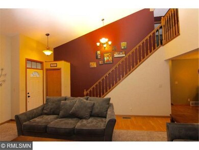 As seen from the family room, the front entry and 