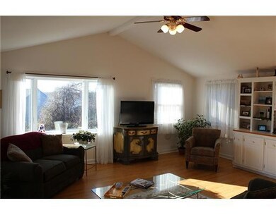 Living Room. Open floor plan with cathedral ceilin