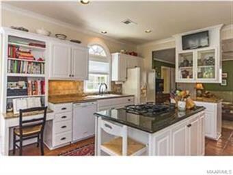 Function, with loads of cabinets and all the appli