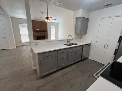 Kitchen featuring dark hardwood / wood-style floor