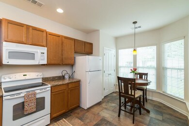 Eat-In area, lots of windows makes it bright and cheery!