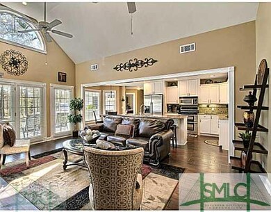 Living Room. Wood Flooring Continues Throughout th