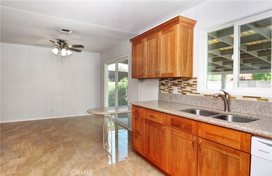 granite countertops and walnut cabinets