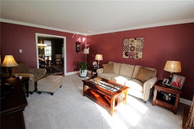 The living and dining rooms are open to each other