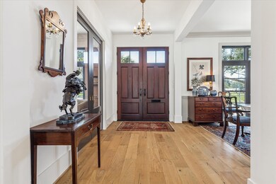 Gracious entry hall with wide plank French oak eng