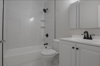 Full bathroom featuring vanity and shower / washtub combination