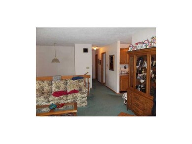 Other. Living room opens to hallway, kitchen and d