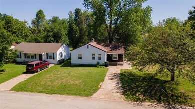 View of front of home featuring a front lawn