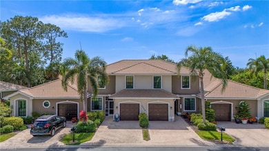 Mediterranean / spanish home featuring stucco siding, driveway, and a tiled roof