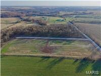 Aerial overview of property's location featuring rural landscape