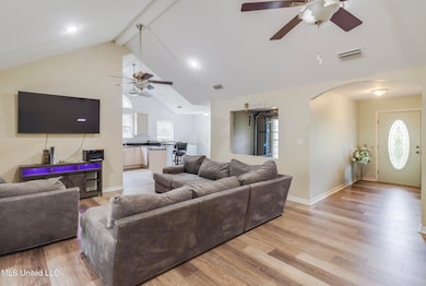 living room to from door and kitchen