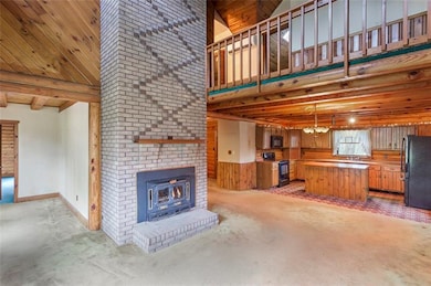 Floor to ceiling Center Log Burning Fireplace