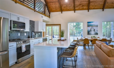 Photo of same model home by same builder