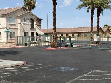 View of property with uncovered parking