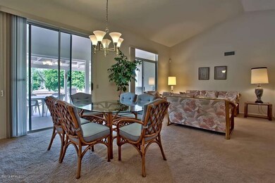 Dining and Living Room toward back Patio
