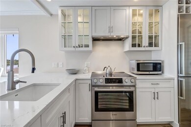 Kitchen with appliances with stainless steel finis